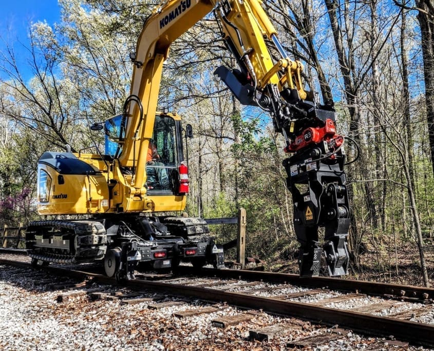 Dymax Rail Rider X2-8T detachable hi-rail attachment for 8-ton track excavators — Cat 308, Deere 85, Komatsu PC88 class
