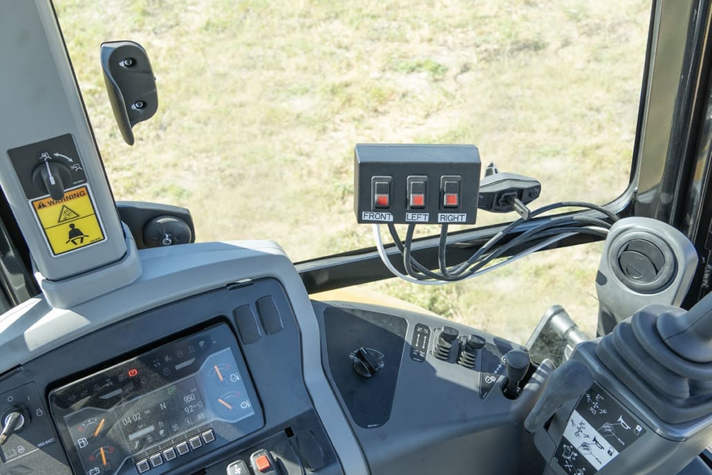In-cab hydraulic control panel for the DymaxRail Rail Rider S-BL stabilizer-mounted hi-rail system, showing simple operator controls for raising and lowering railgear from the cab