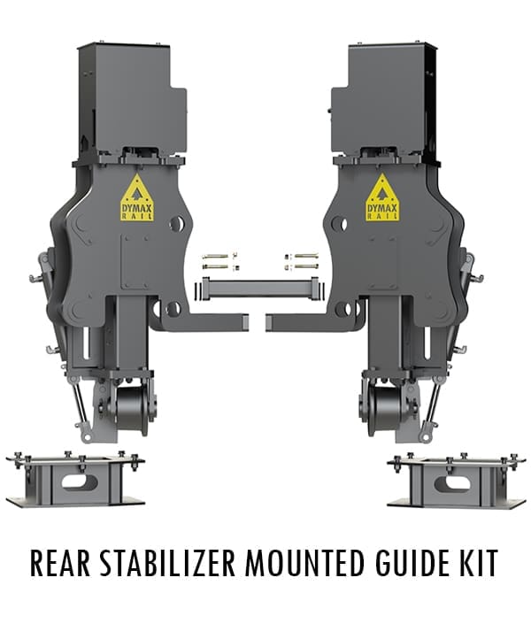 DymaxRail Rail Rider S-BL DQH7 rear stabilizer-mounted railgear kit for John Deere 410 and 710 backhoe loaders, showing outrigger pads, hydraulic components, and 7-inch retractable rail wheels