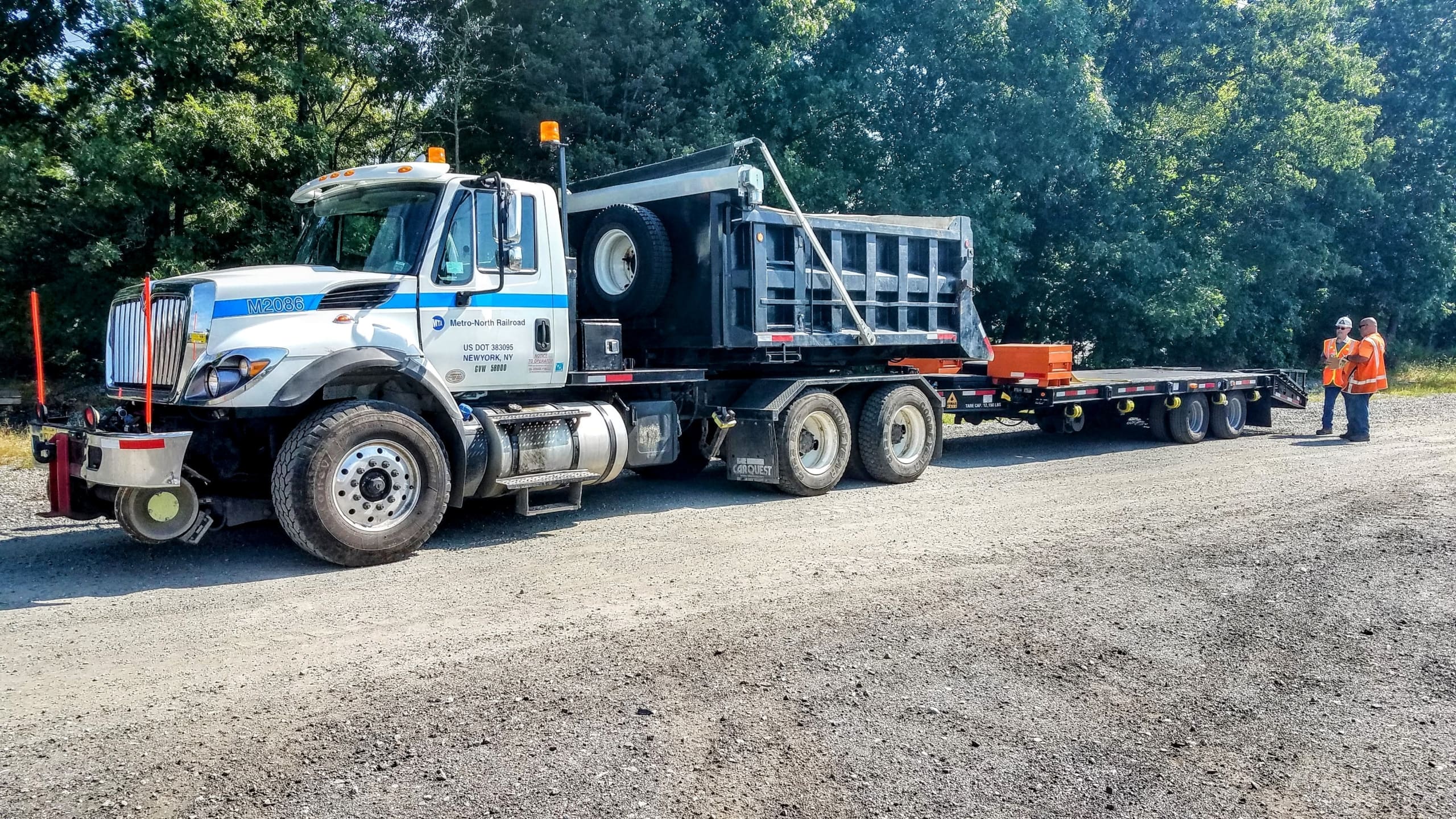 Metro North hi rail trailer with road and rail wheels Metro North Transit using a hi rail trailer with road and rail wheels for rail maintenance work
