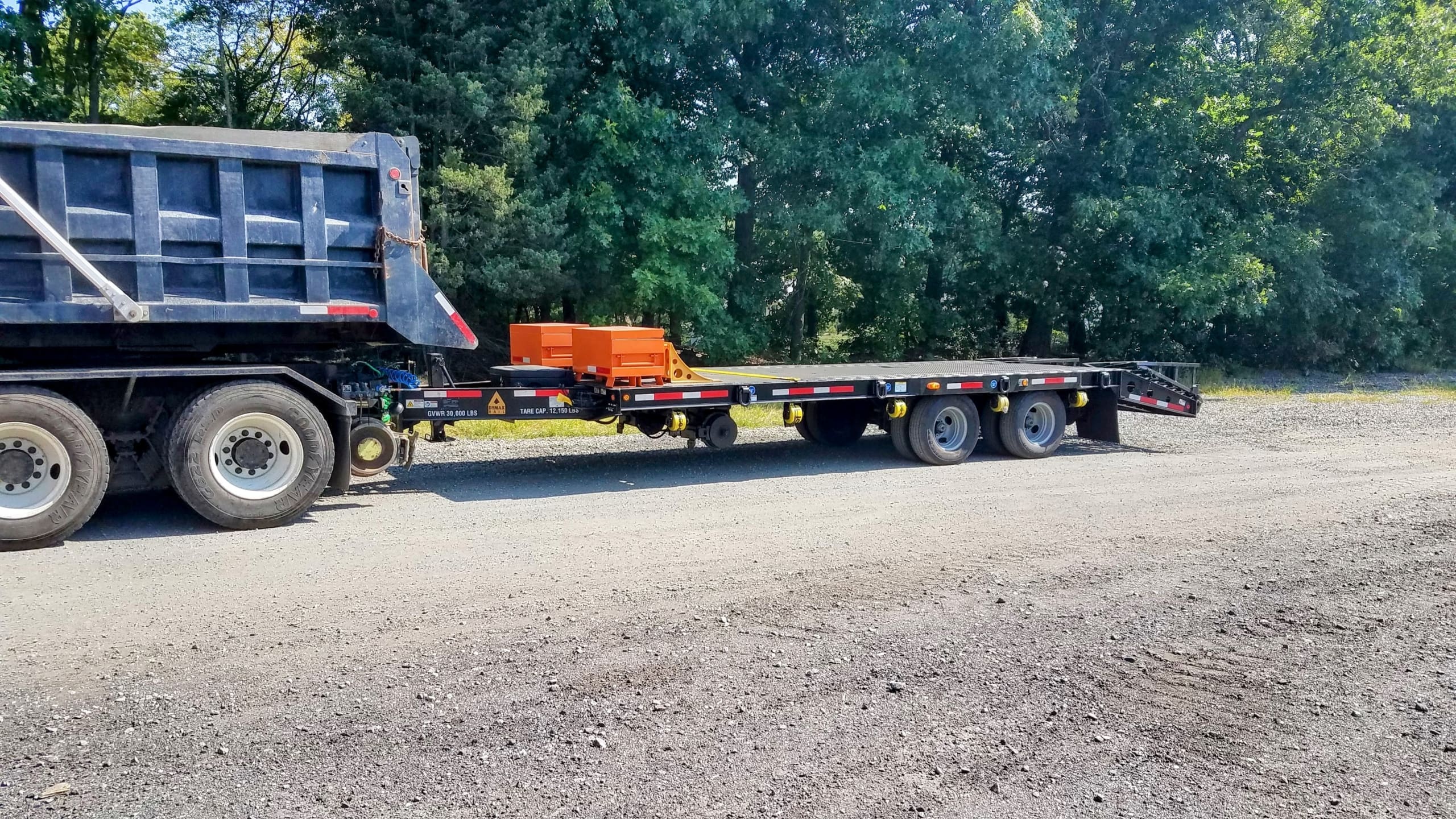 Tag along hi rail trailer and truck Truck pulling a tag along hi rail trailer built by DymaxRail
