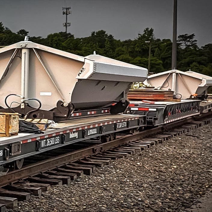 Click to show details - DymaxRail Side Dump Rail Cart DymaxRail side dump rail cart on railroad track