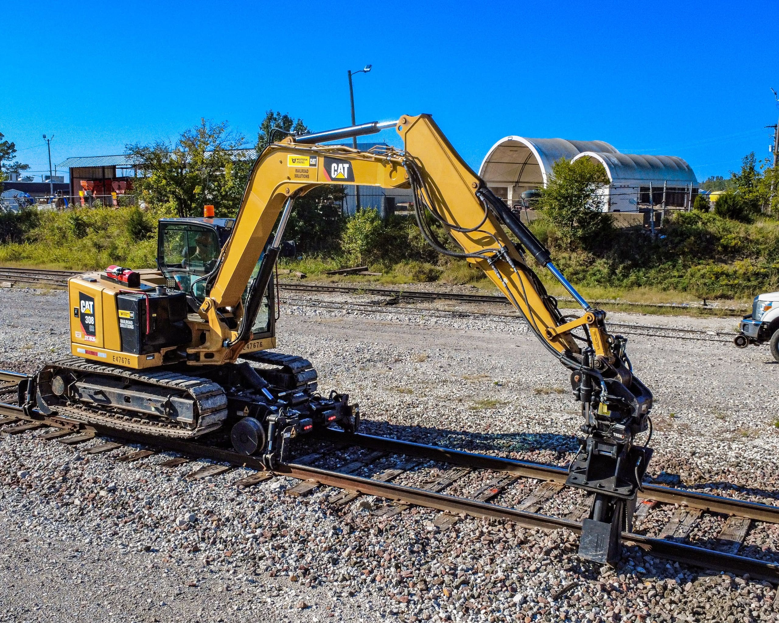 Dymax Rail Rider X2-8T detachable hi-rail attachment for 8-ton track excavators — Cat 308, Deere 85, Komatsu PC88 class