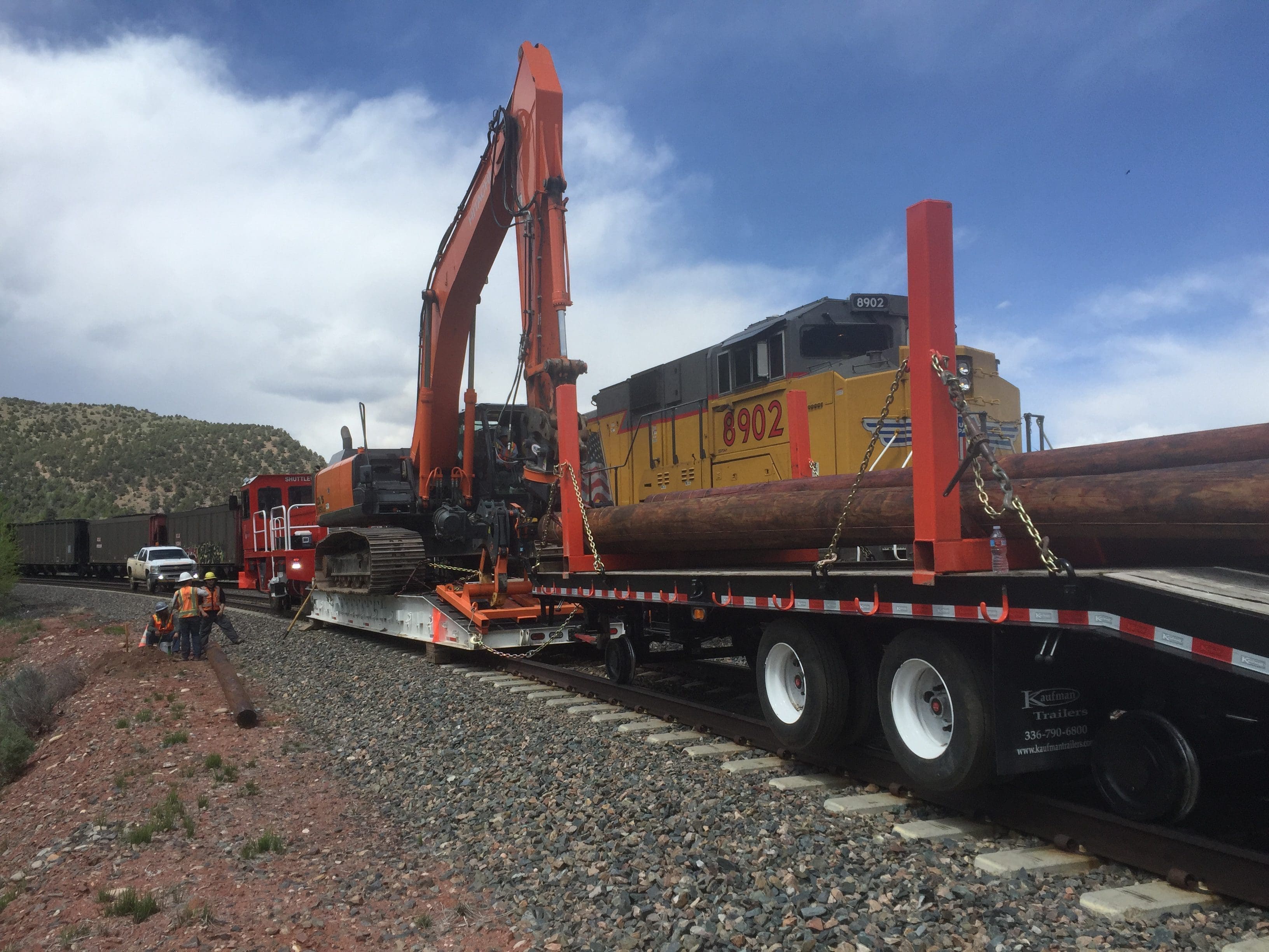 Union Pacific Training Passing By Machiney Rail Cart