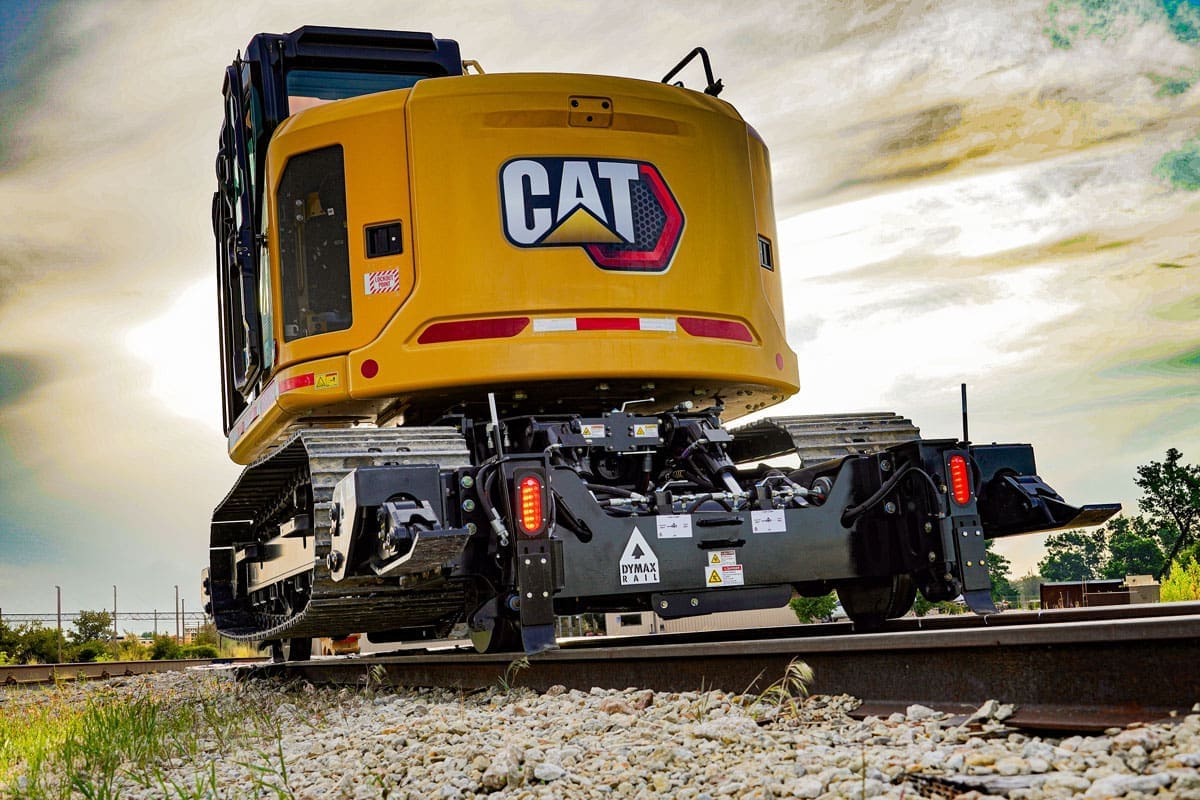 DymaxRail X2-15T Rear Rail Gear on Track Excavator Rear rail gear installed on 15-ton track excavator with DymaxRail X2 hi-rail system